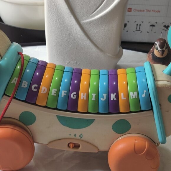 Wooden Alpha Pup Learning Toy, Pull along puppy teaches letters, sounds, songs. - Picture 4 of 10